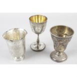 A Victorian silver goblet, together with a further Victorian goblet or cup, and an early George V
