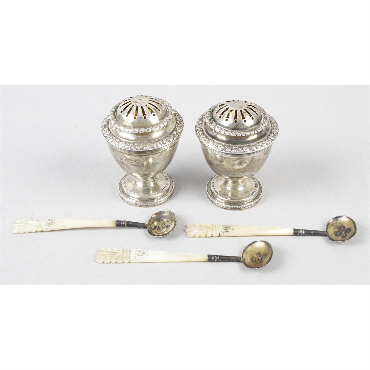 A pair of late George III silver pounce pots, together with three William IV silver &