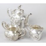 A Chinese export silver three piece tea set.