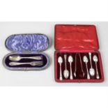 An Edwardian cased set of silver spoons with pair of sugar tongs, together with a cased fork &