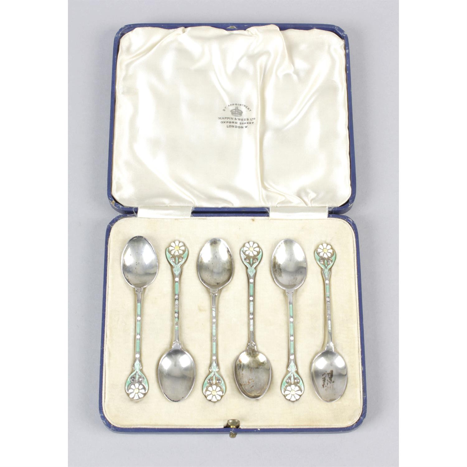 A cased set of 1930's silver and enamel coffee spoons by Mappin & Webb Ltd.