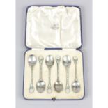 A cased set of 1930's silver and enamel coffee spoons by Mappin & Webb Ltd.