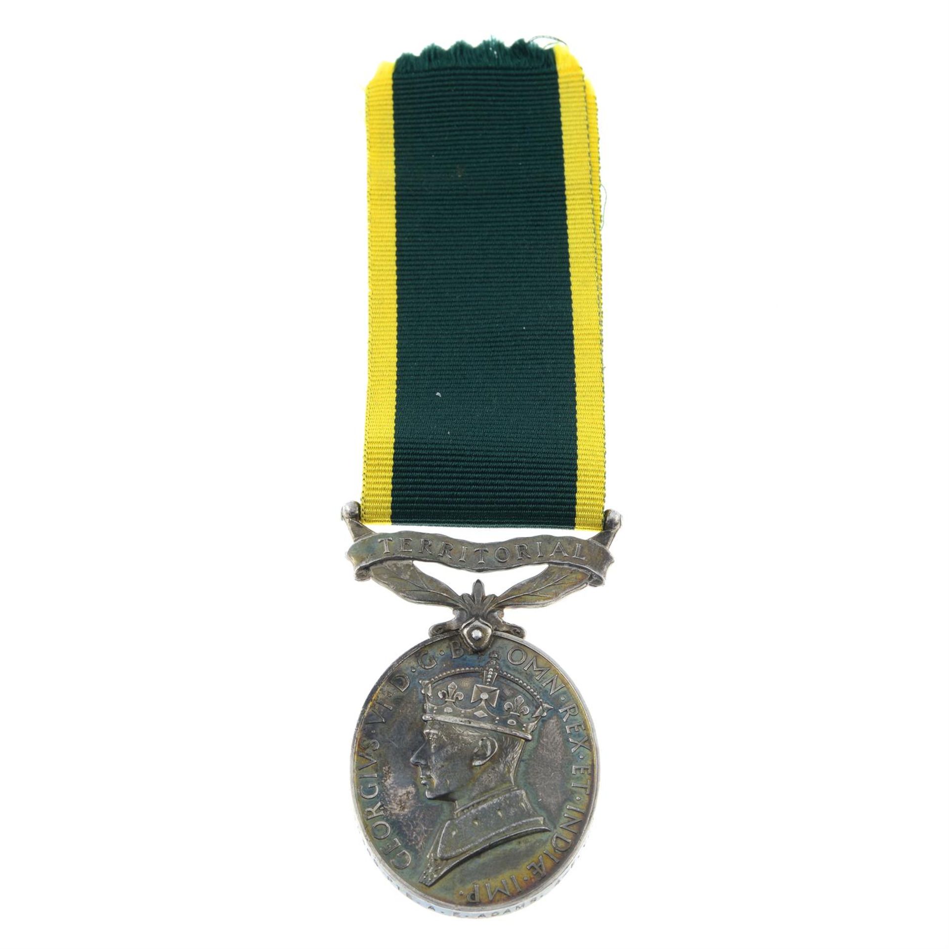 A group of four WWII medals, together with Efficiency Medal (Territorial). (5). - Image 3 of 4