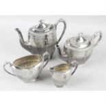 A selection of silver plated items, to include a teaset, kettle on stand, biscuit container,