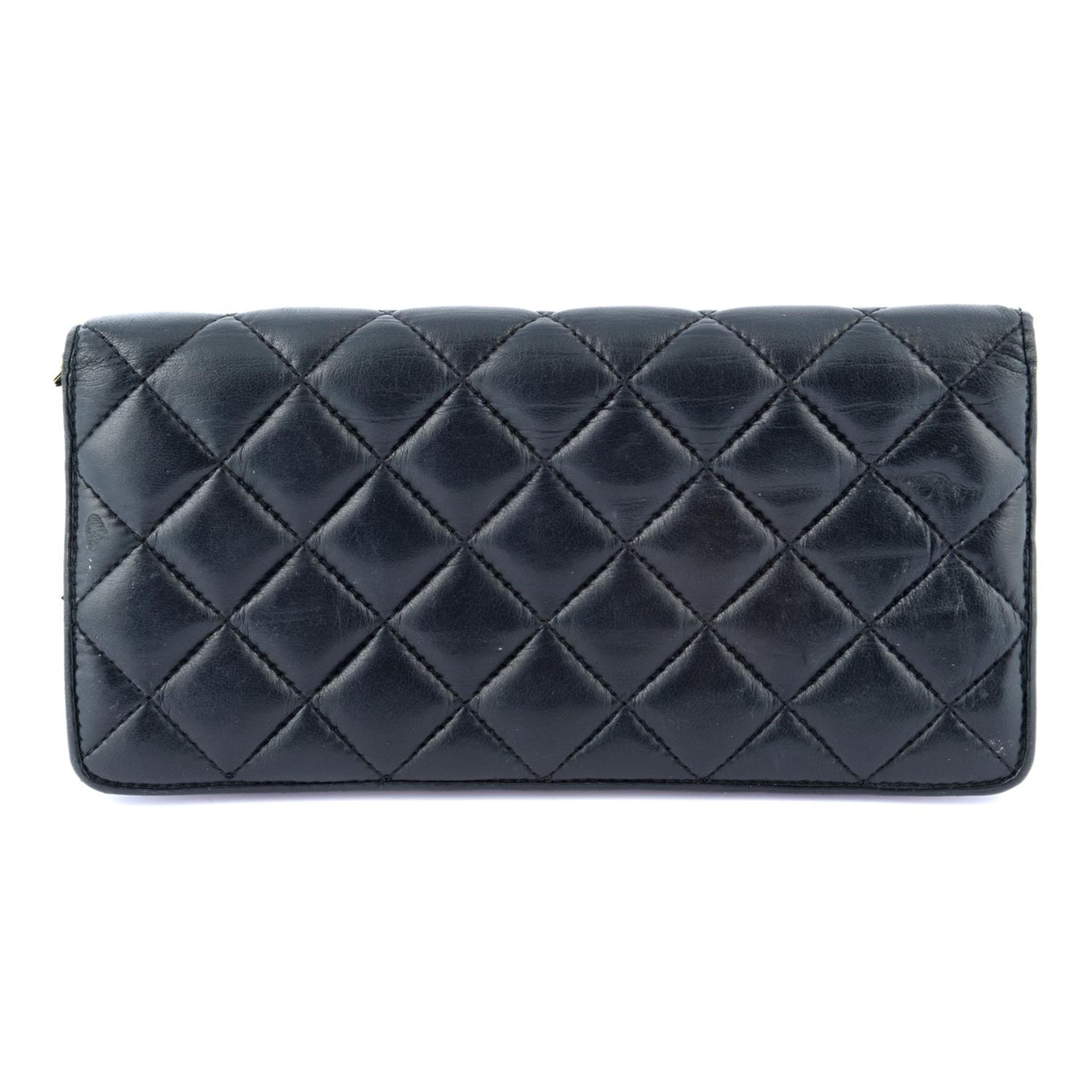 CAROLINA HERRERA - a black quilted leather wallet. - Bild 2 aus 3