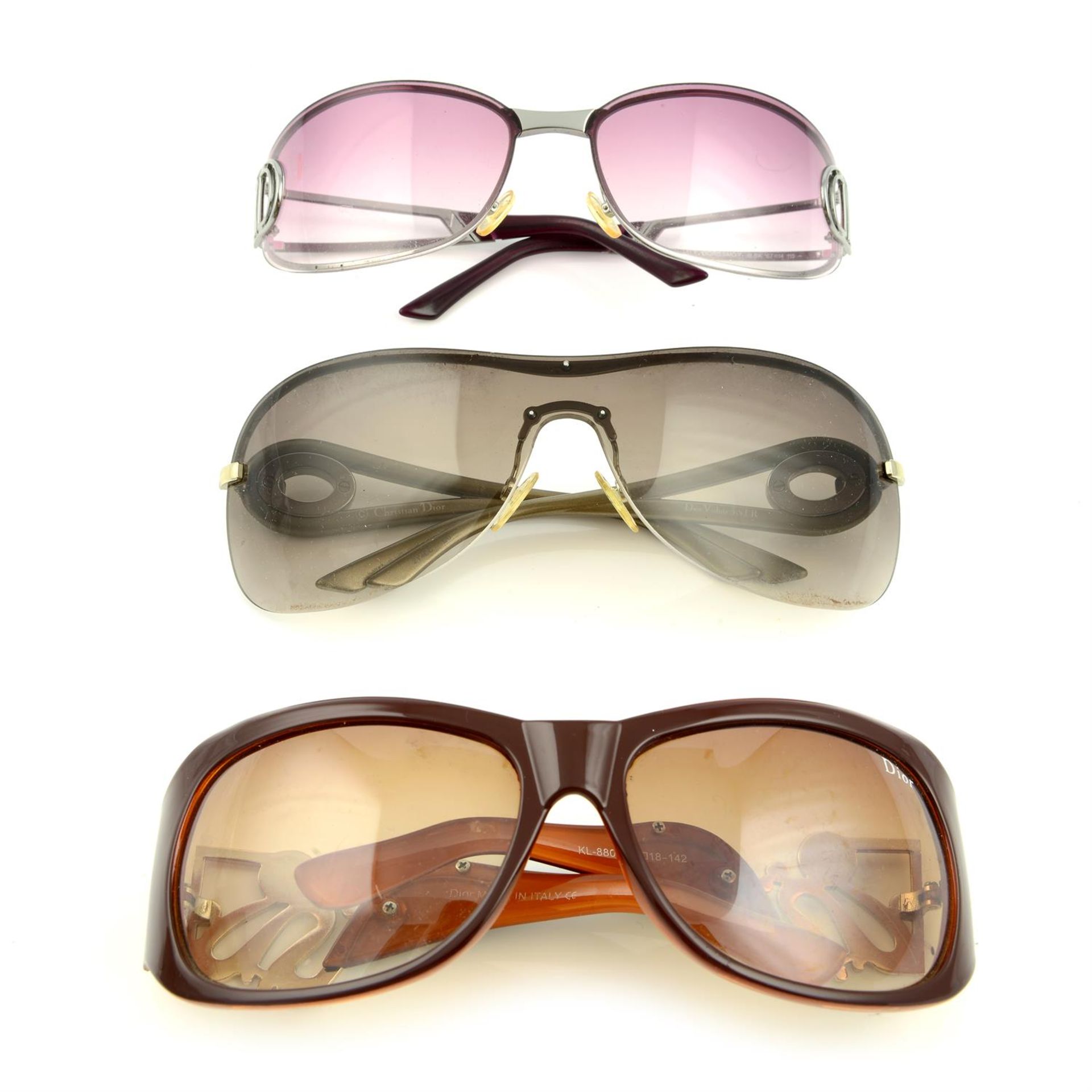 CHRISTIAN DIOR - three pairs of sunglasses.