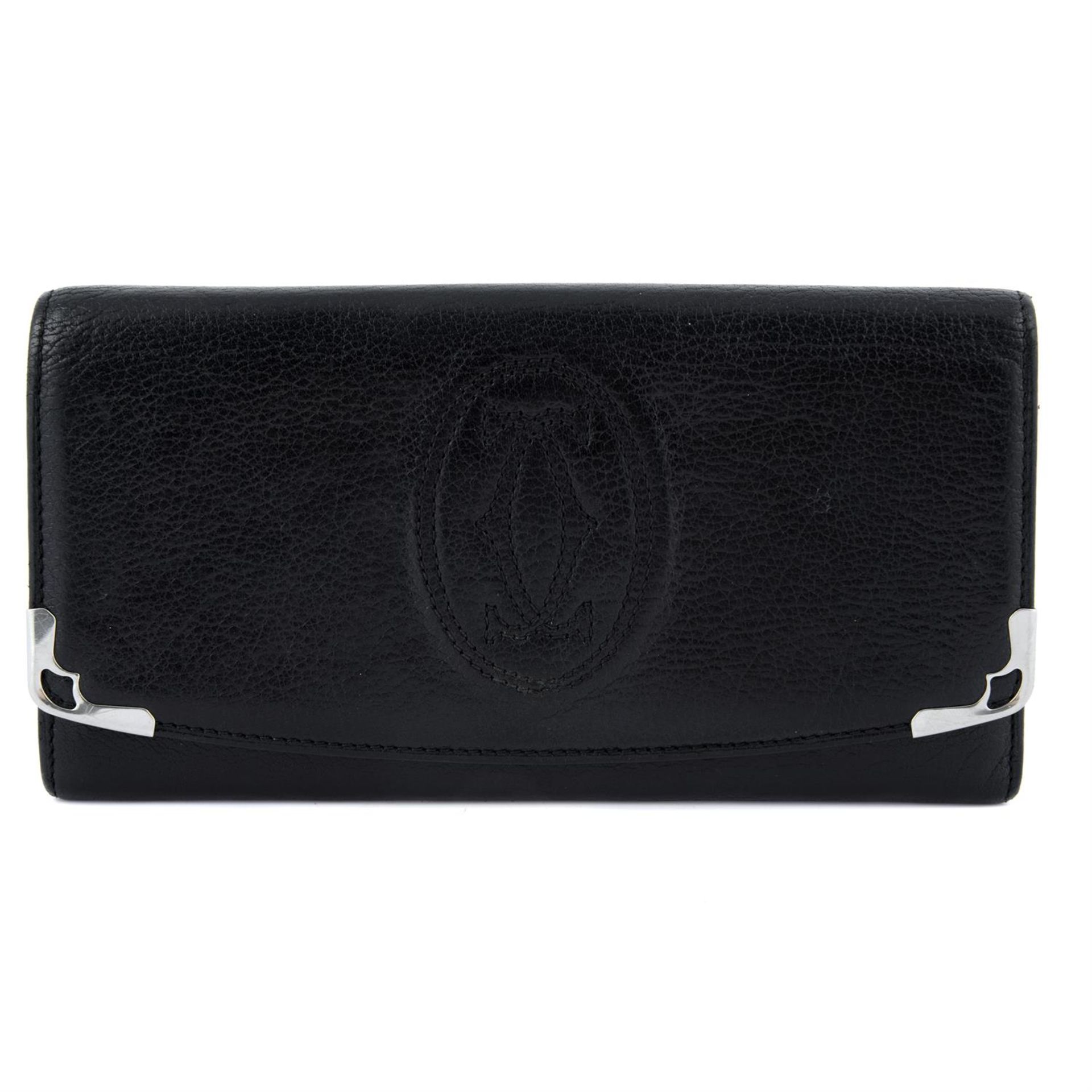 CARTIER - a black Long Bifold Wallet.