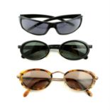 CALVIN KLEIN - three pairs of sunglasses.