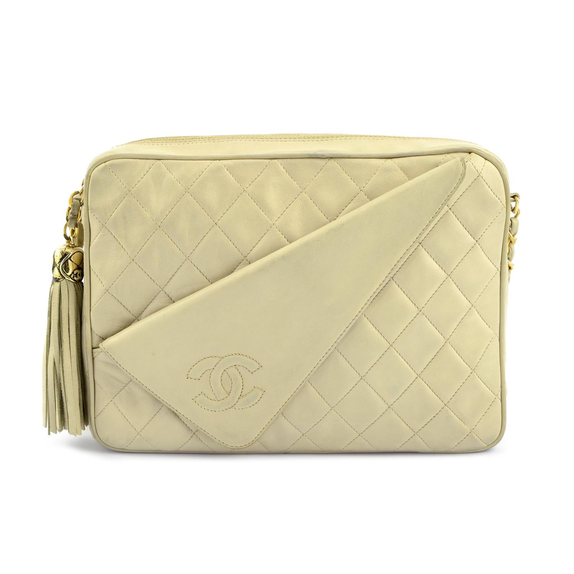 CHANEL - a 1990 quilted Camera Bag with tassel.