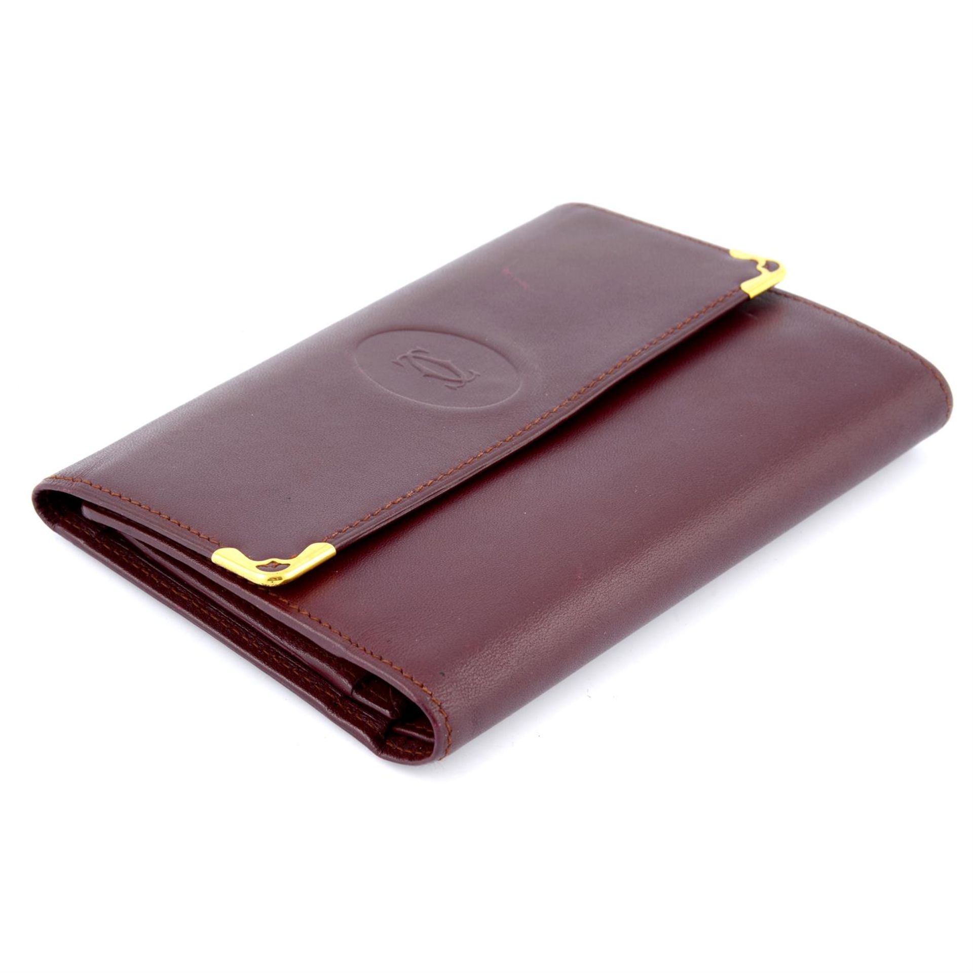 CARTIER - a red Must de Cartier French Flap Wallet. - Bild 3 aus 3