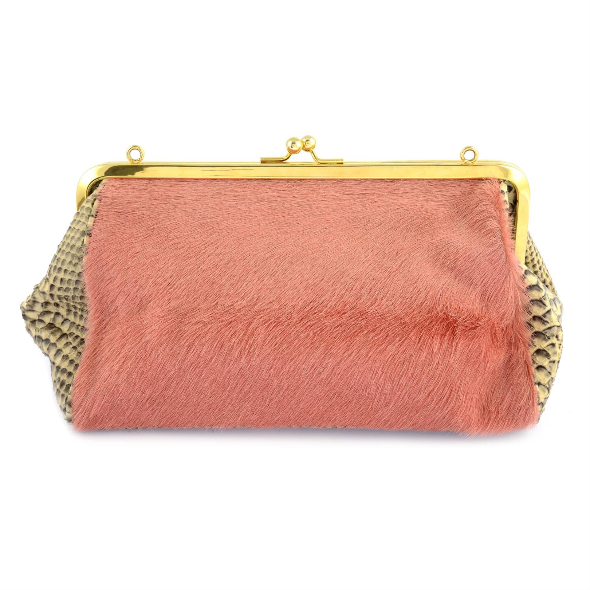 BERGE - a pink pony fur and snakes skin handbag.