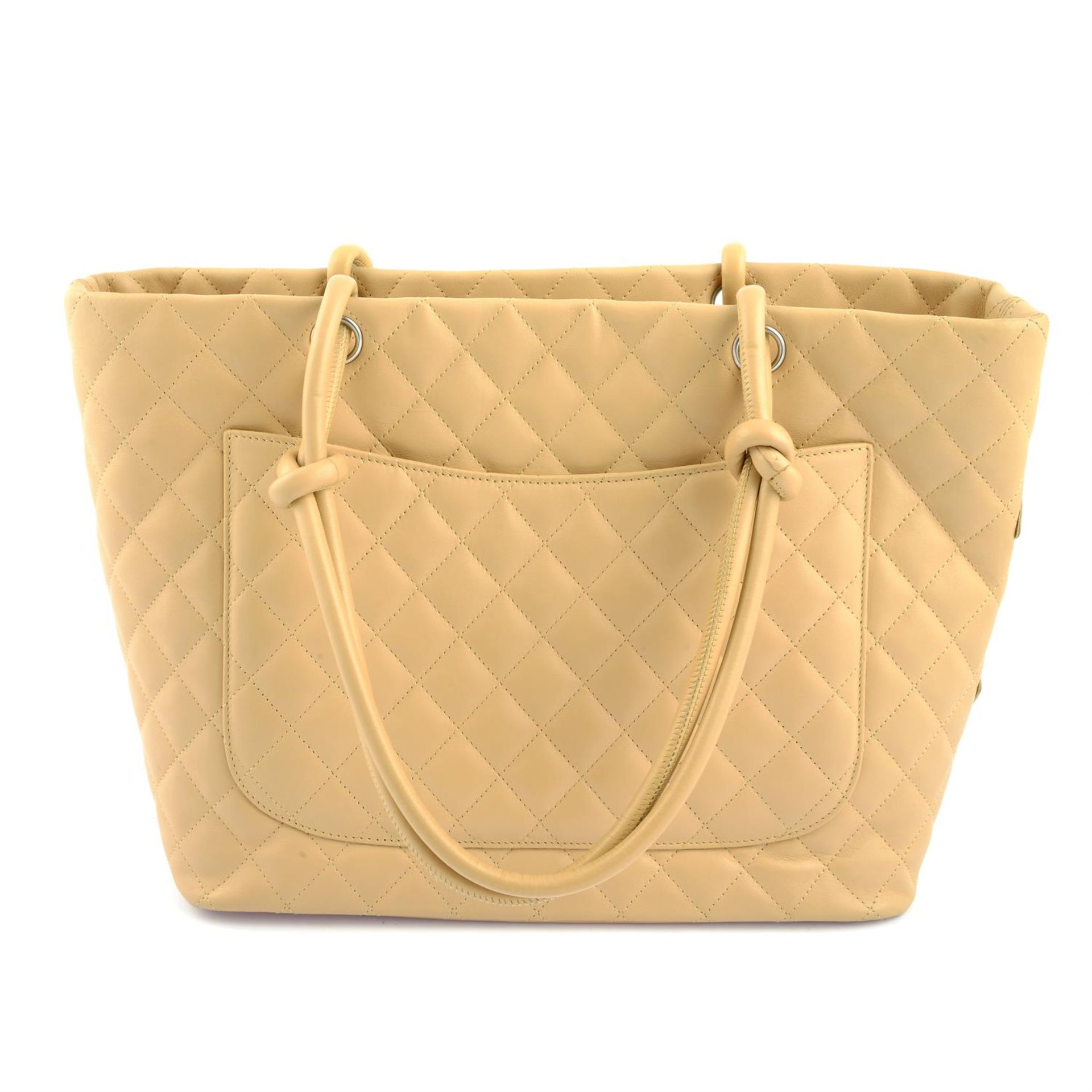 CHANEL - a beige CC Cambon leather tote bag. - Image 2 of 5