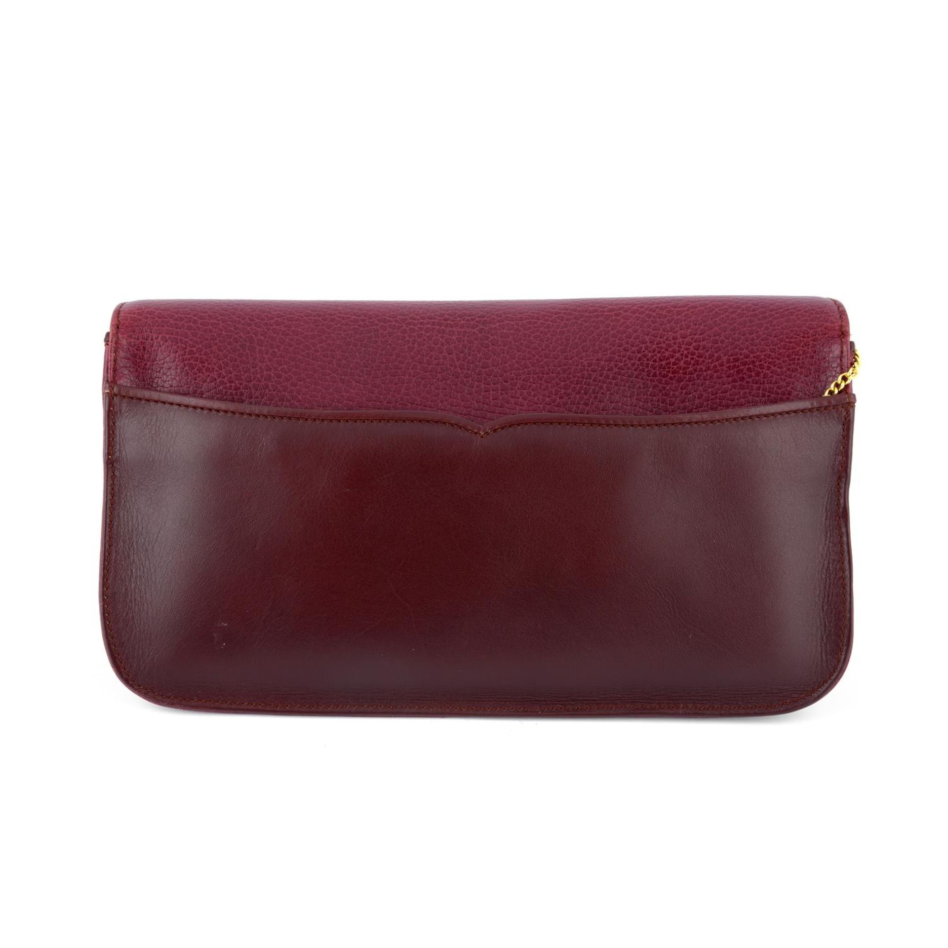 CARTIER - a 1989 red leather clutch. - Image 2 of 4