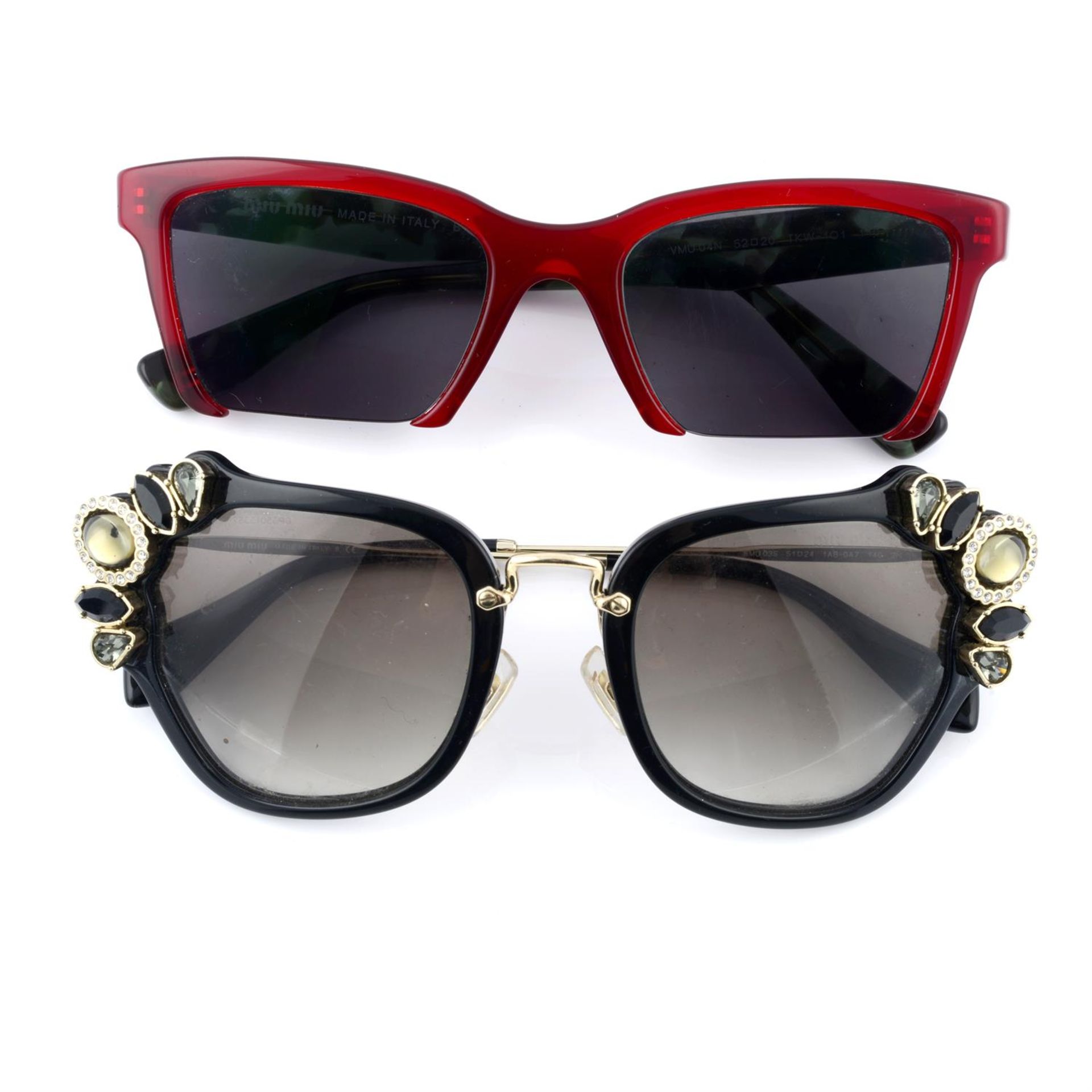 MIU MIU - two pairs of sunglasses.