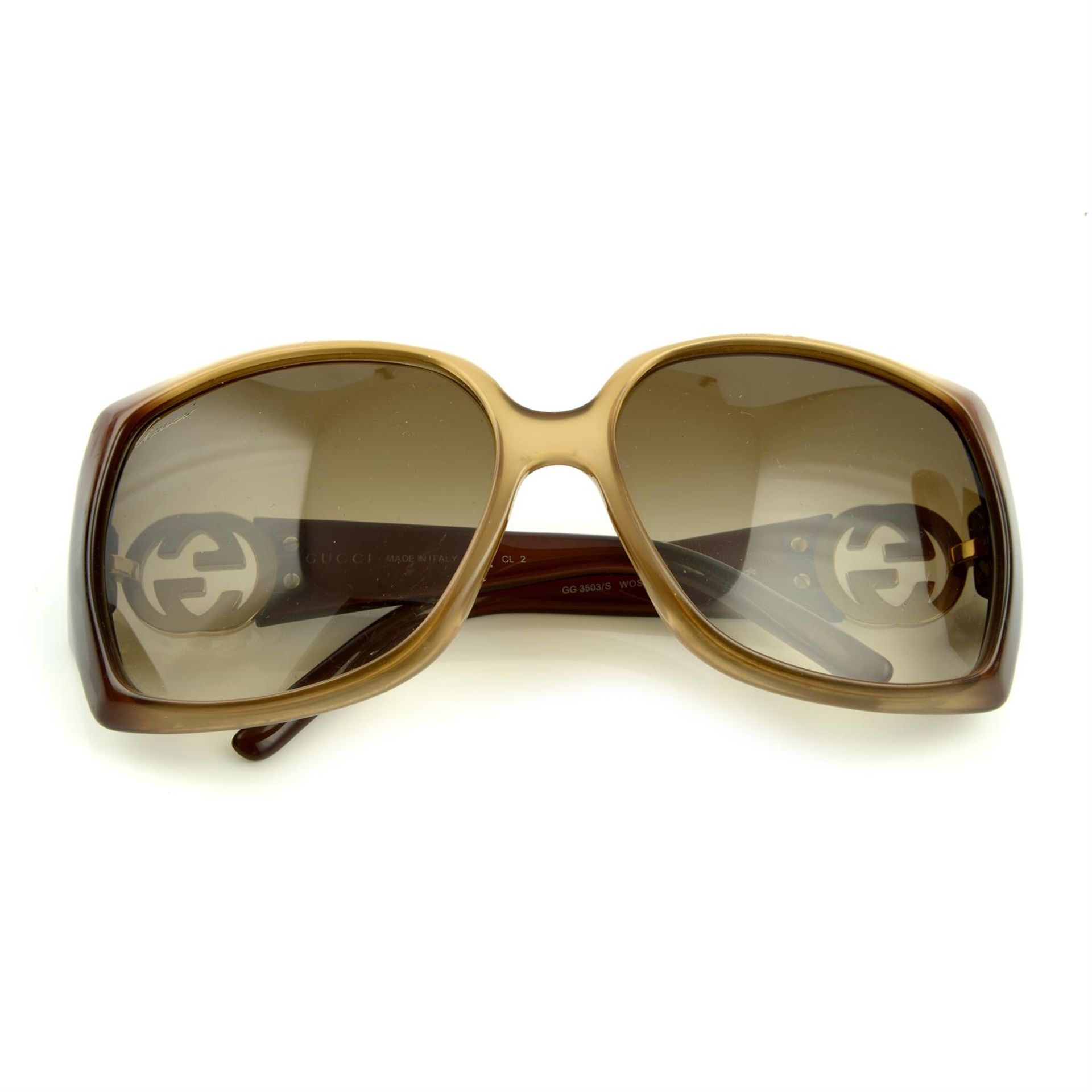 GUCCI - a pair of sunglasses.