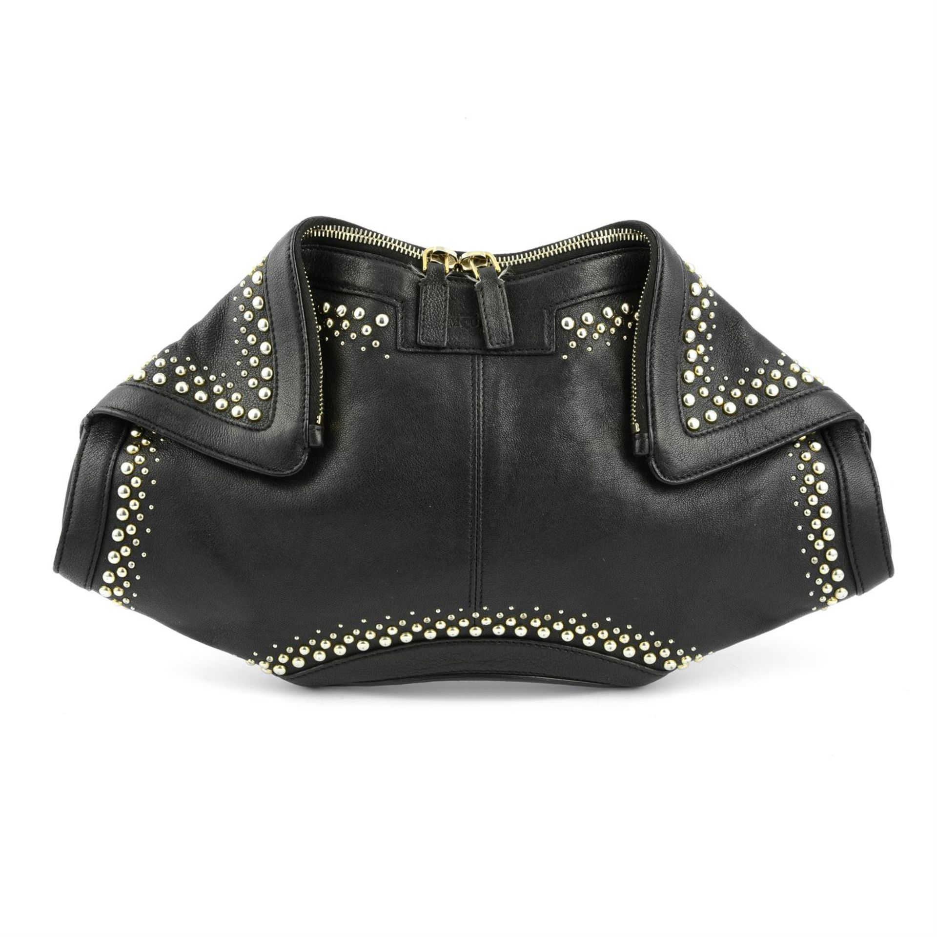 ALEXANDER MCQUEEN - a black leather studded De Manta clutch.