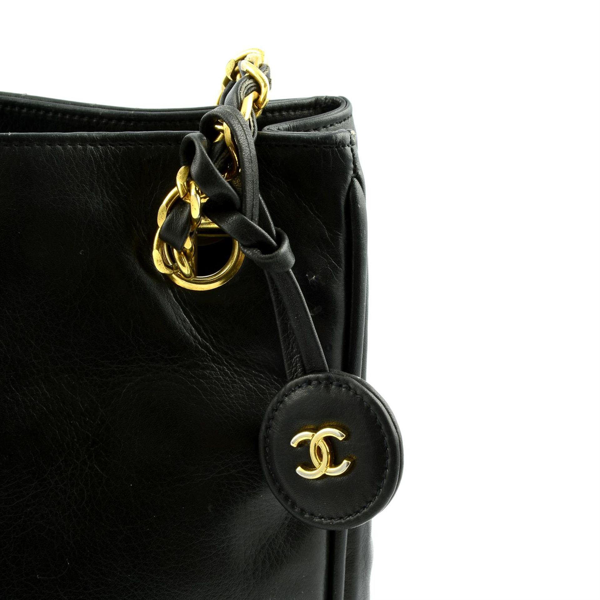 CHANEL - a 1990 black quilted tote bag. - Image 5 of 6