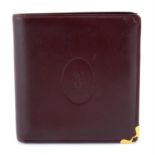 CARTIER- a red Compact Bifold Wallet.