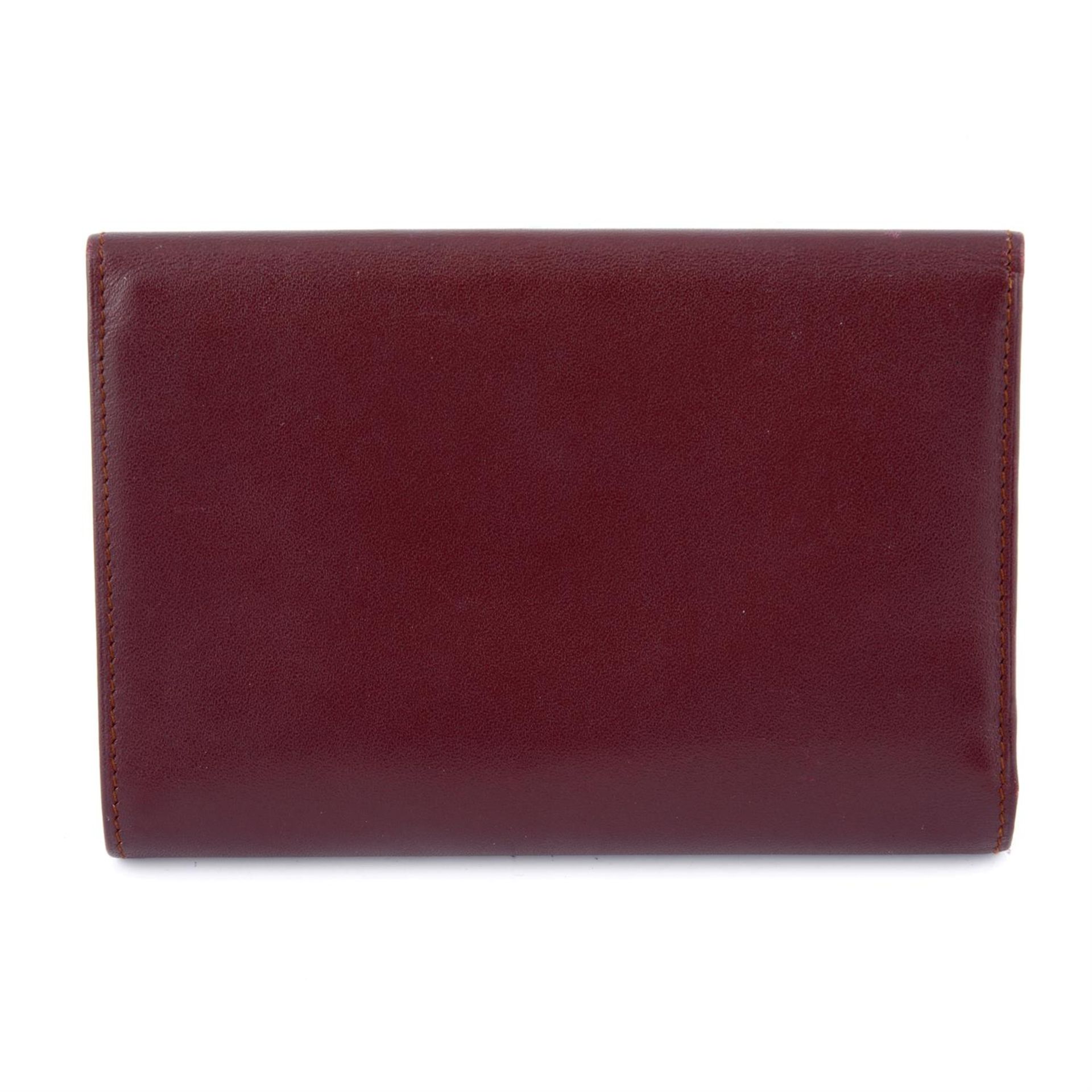 CARTIER - a red Must de Cartier French Flap Wallet. - Bild 2 aus 3