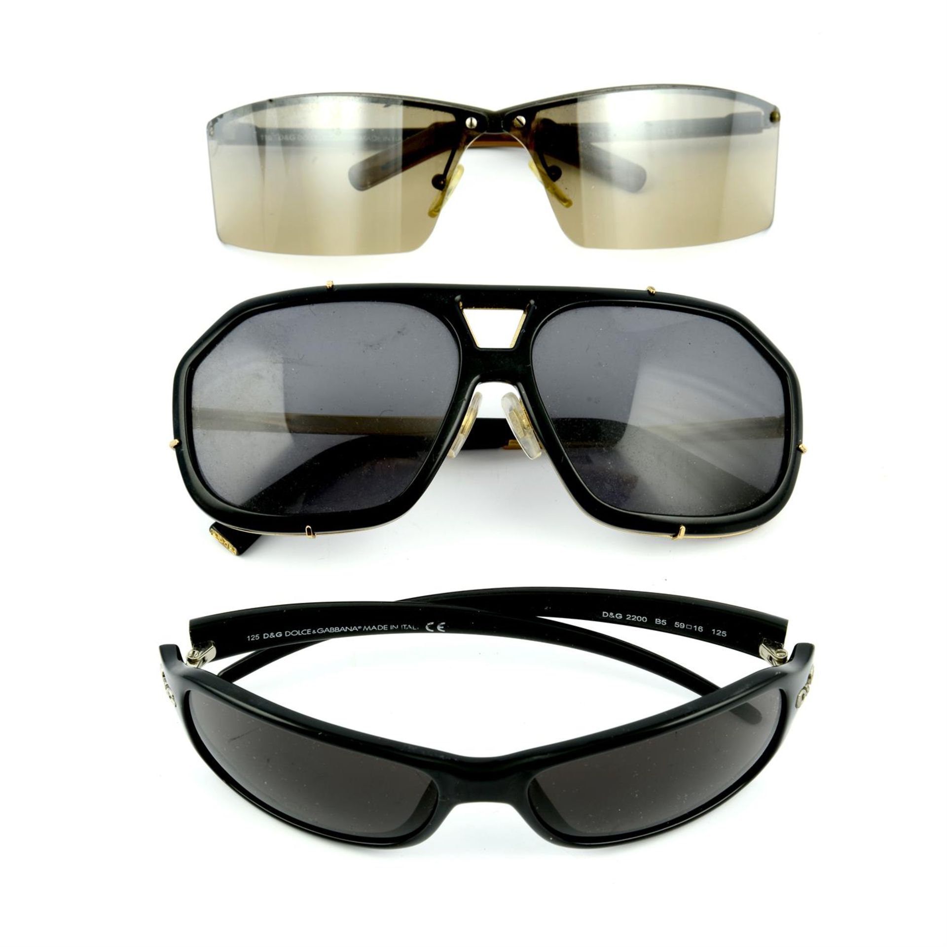 DOLCE & GABBANA - three pairs of sunglasses.