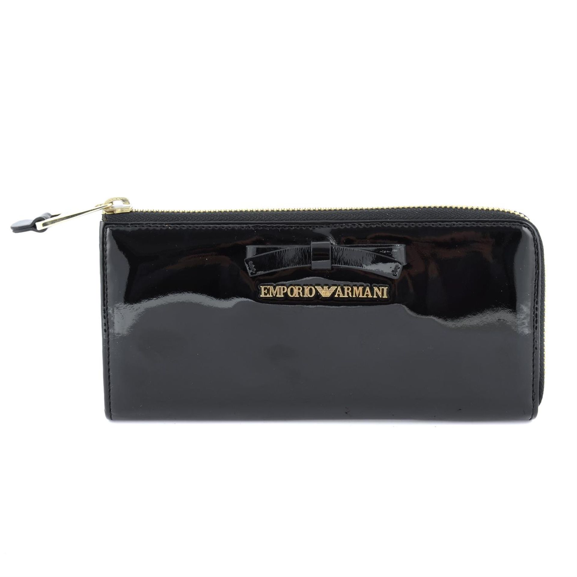ARMANI - a black patent leather wallet.