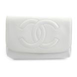 CHANEL - a 1996 white caviar leather cosmetic pouch.