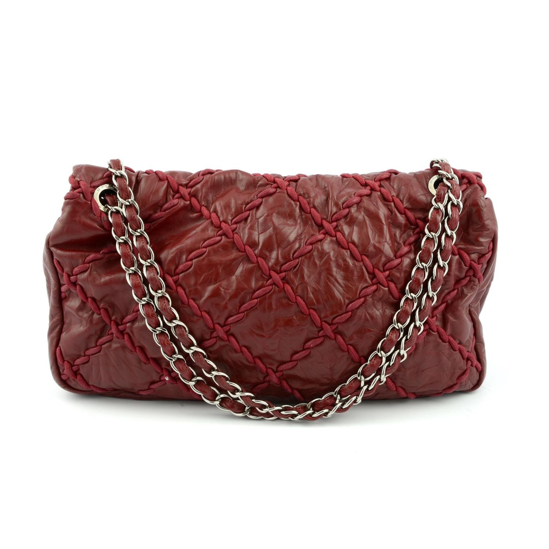 -CHANEL - a 2009 Bordeaux Jumbo ultra stitch flap bag. - Image 2 of 5