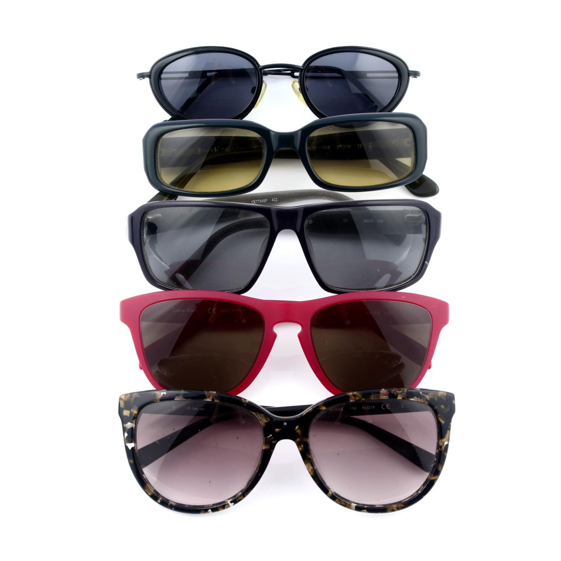 CALVIN KLEIN - five pairs of sunglasses.