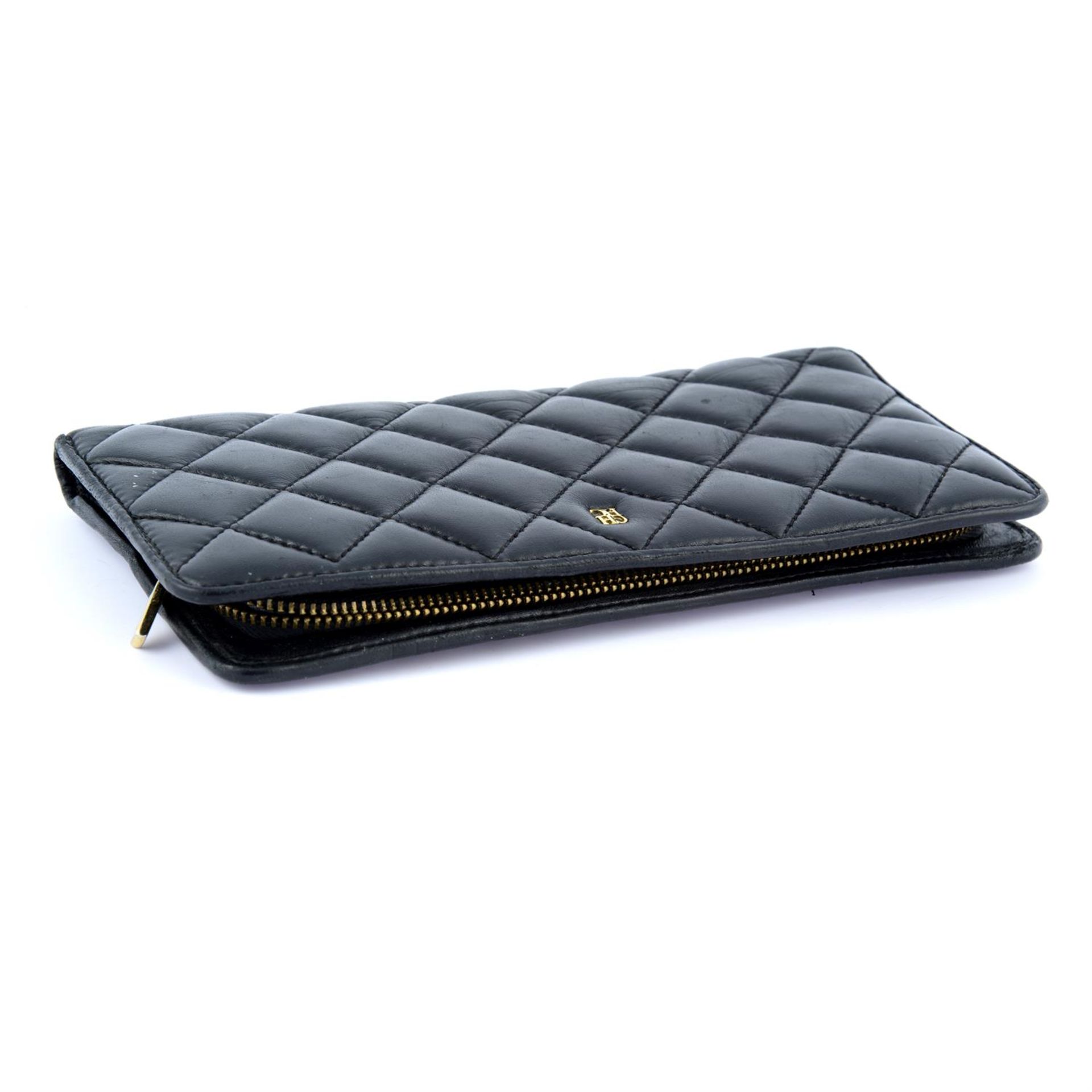 CAROLINA HERRERA - a black quilted leather wallet. - Image 3 of 3