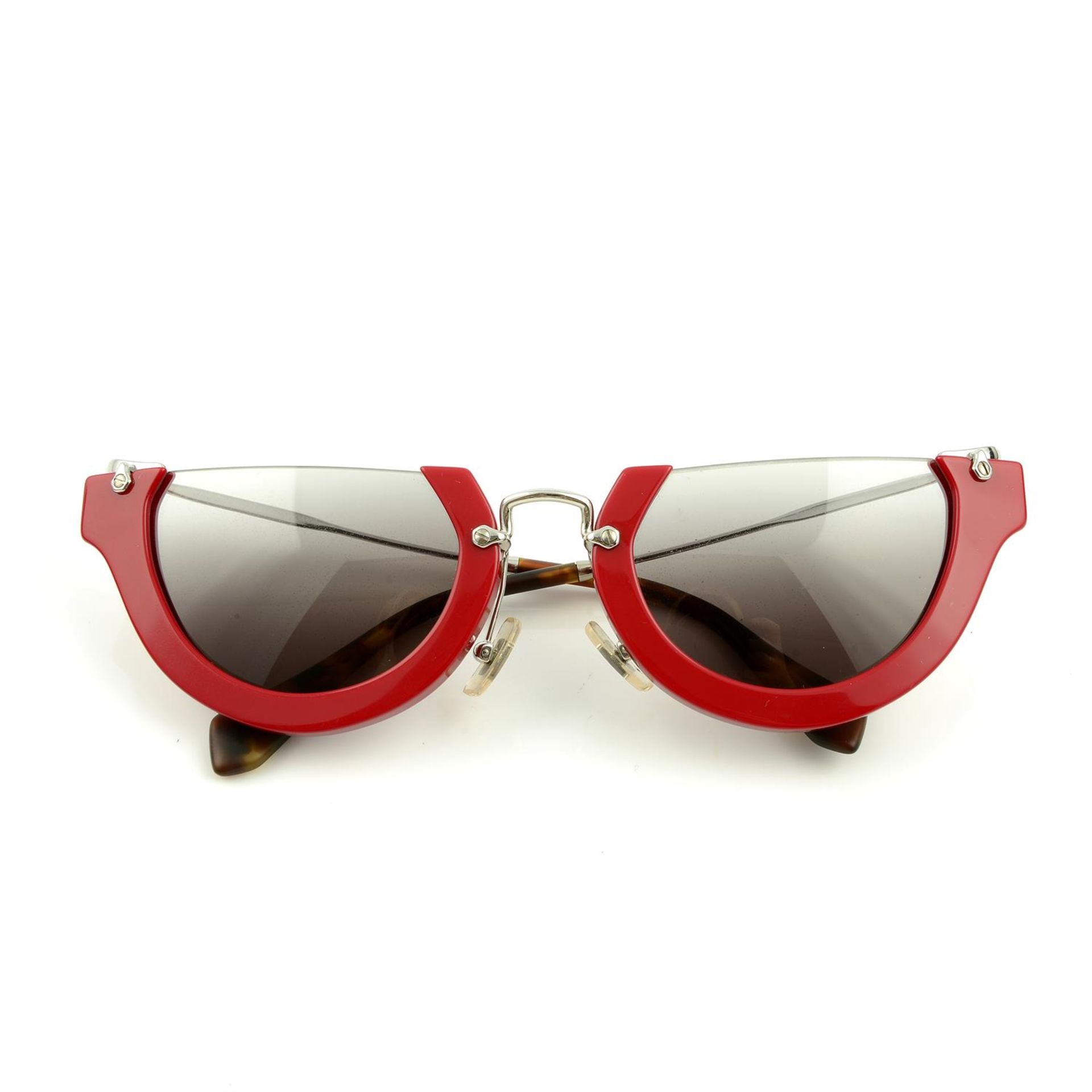 MIU MIU - a pair of sunglasses.