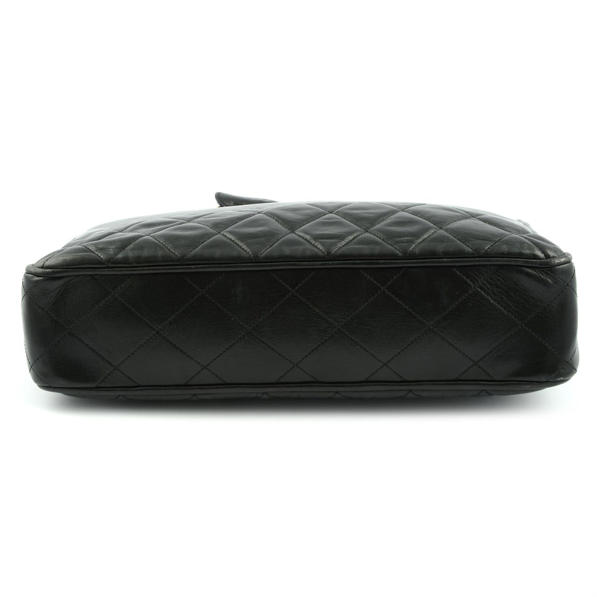 CHANEL - a 1990 black quilted tote bag. - Image 4 of 6