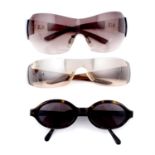 ARMANI - three pairs of sunglasses.
