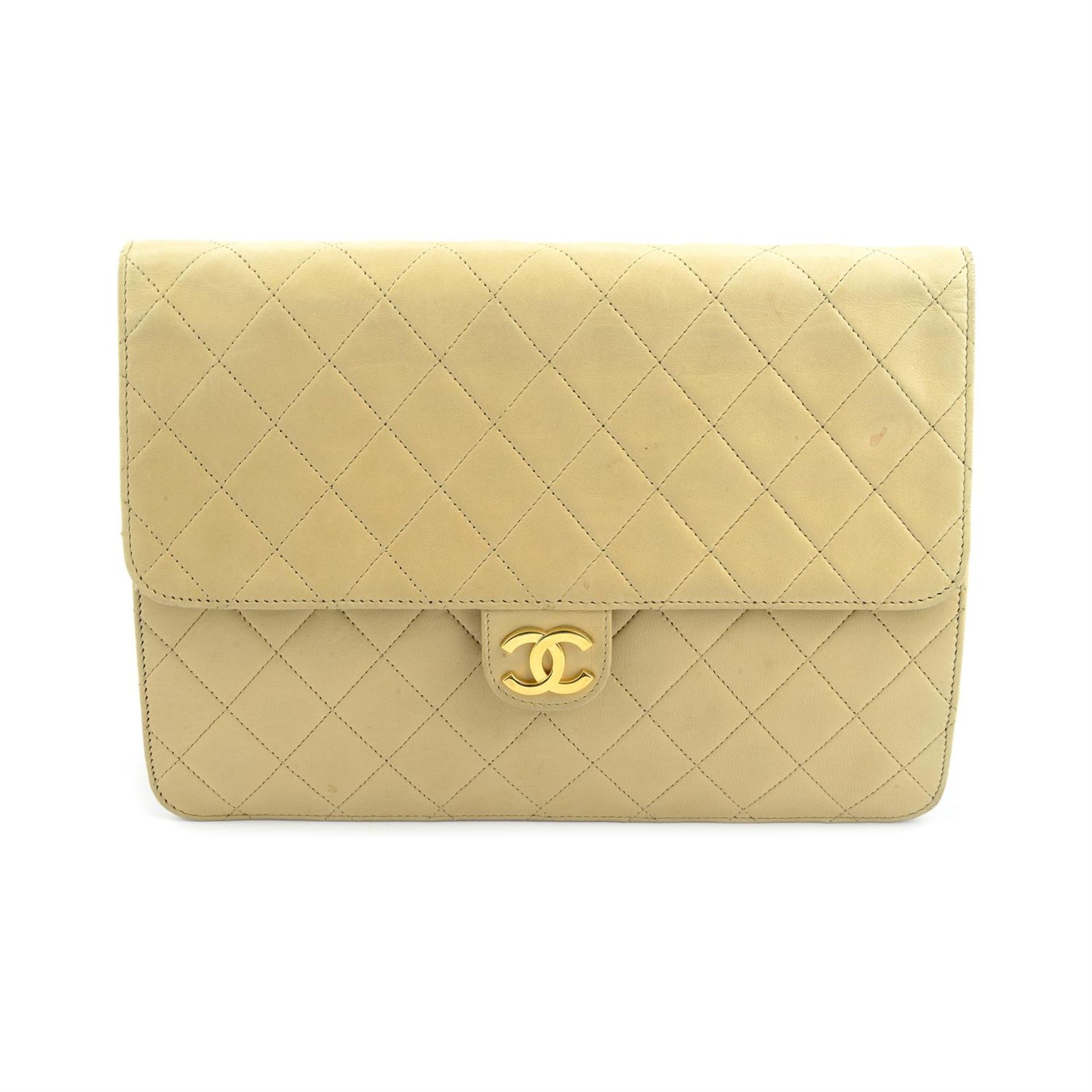 CHANEL - a Metelassé lambskin shoulder bag.