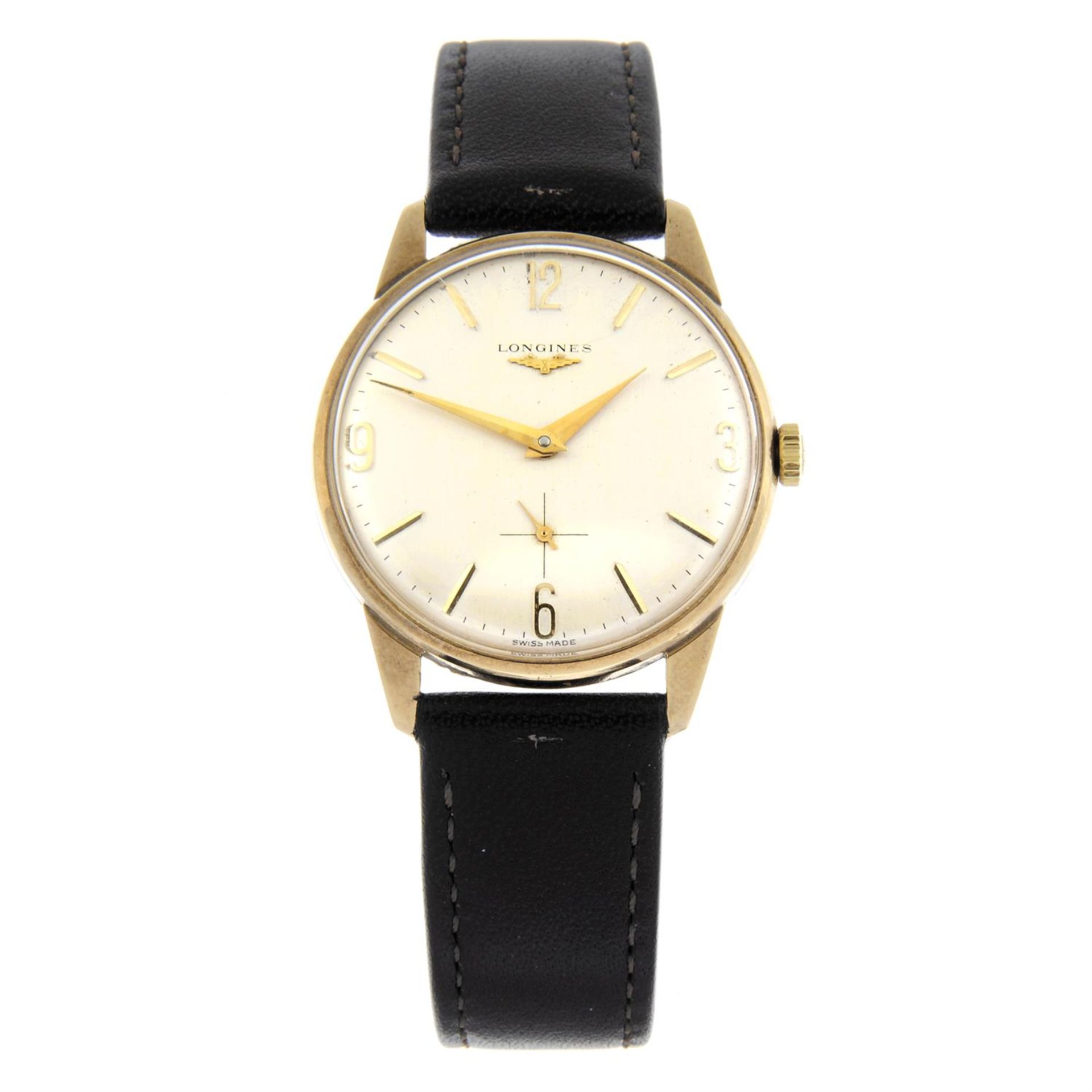 LONGINES - a yellow metal wrist watch, 33mm.
