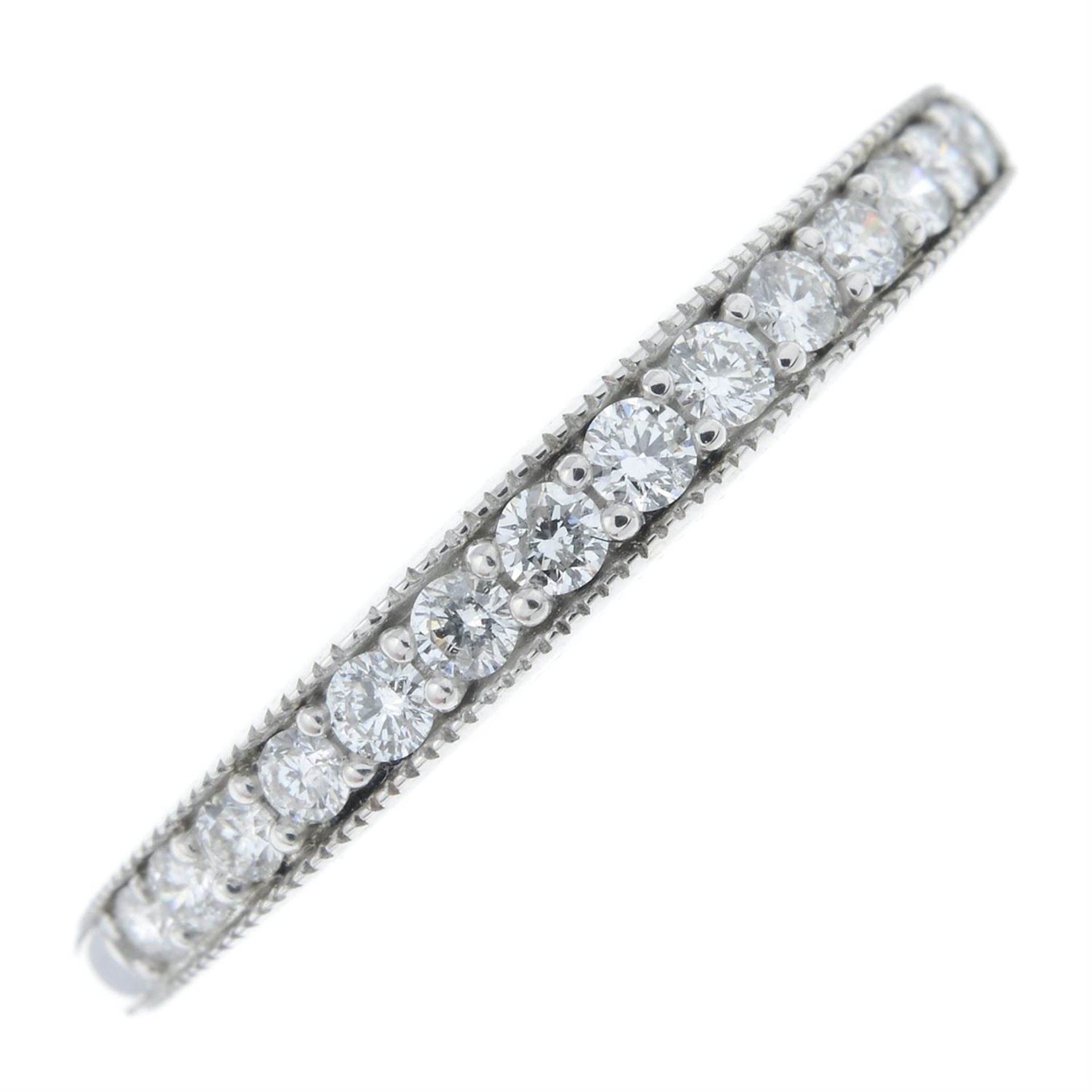 A 9ct gold diamond half eternity ring.