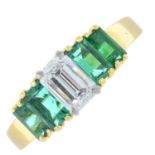 An 18ct gold baguette-cut diamond and emerald dress ring.