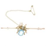 A late Victorian 9ct gold aquamarine and split pearl spider bar brooch, with safety chain.