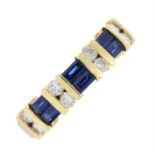 A sapphire and brilliant-cut diamond two-row ring.
