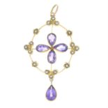 An early 20th century gold amethyst and split pearl pendant.