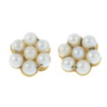A pair of cultured seed pearl cluster screw-back stud earrings.