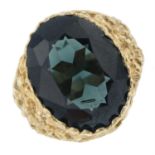 A 9ct gold synthetic green spinel dress ring.