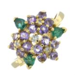 An 18ct gold amethyst, emerald and diamond cluster dress ring.