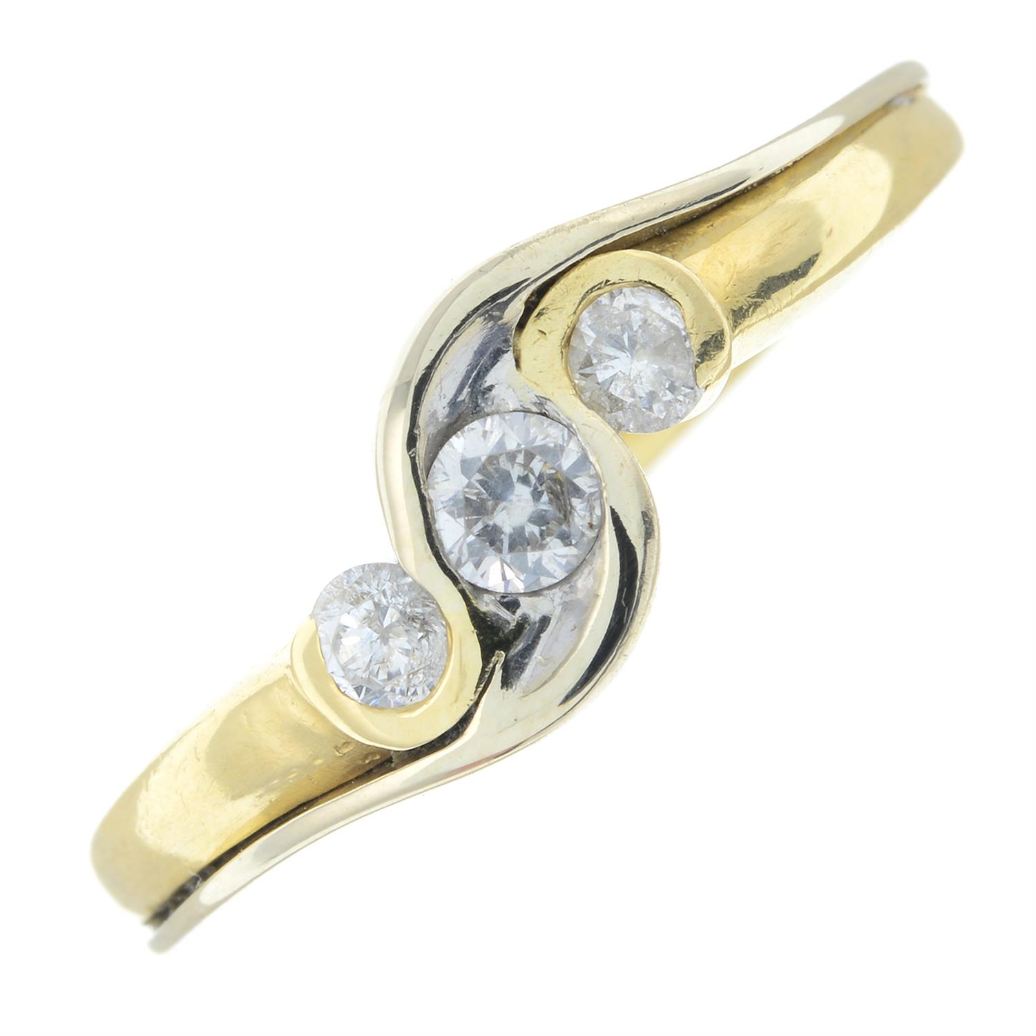 A brilliant-cut diamond three-stone ring.