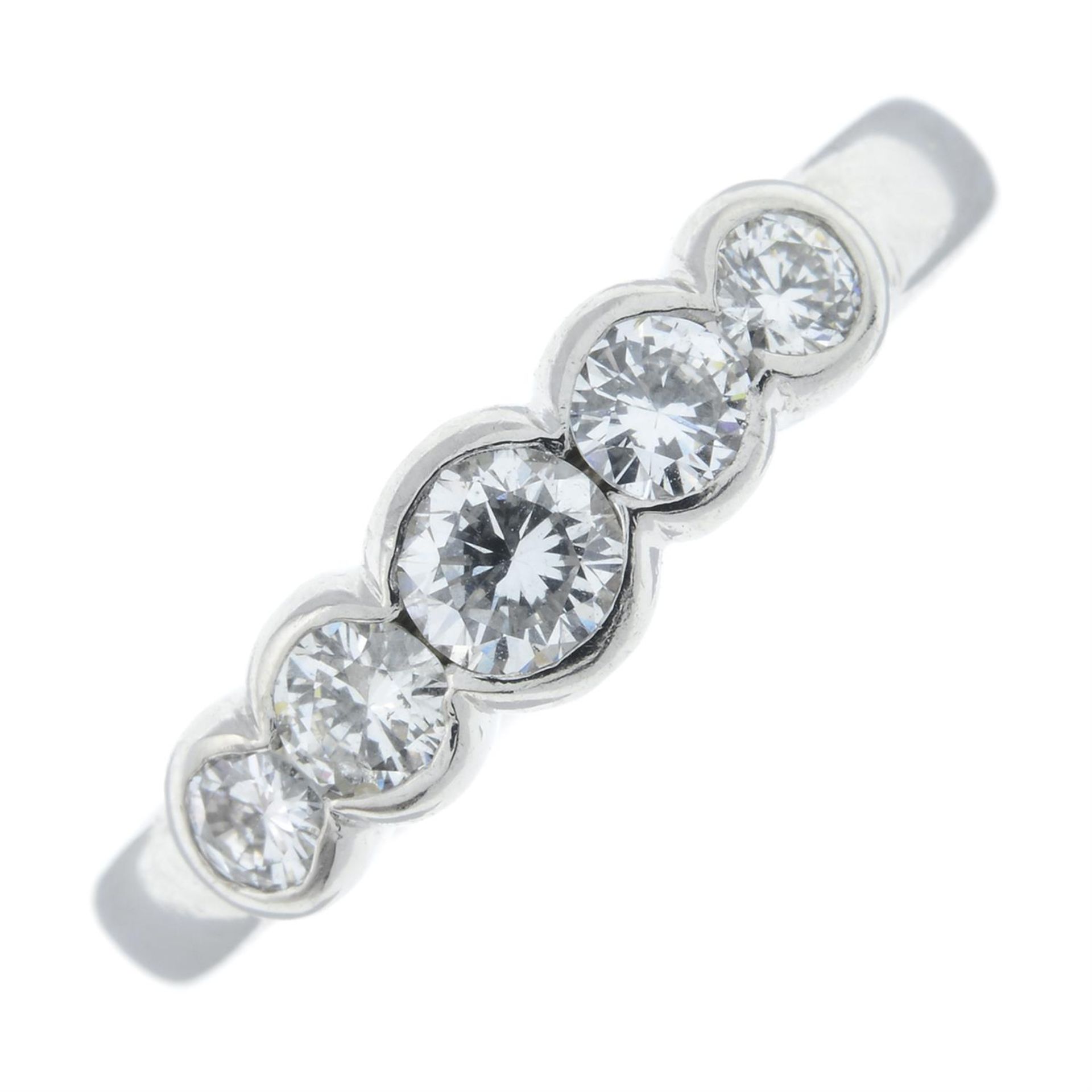 A platinum brilliant-cut diamond five-stone ring.