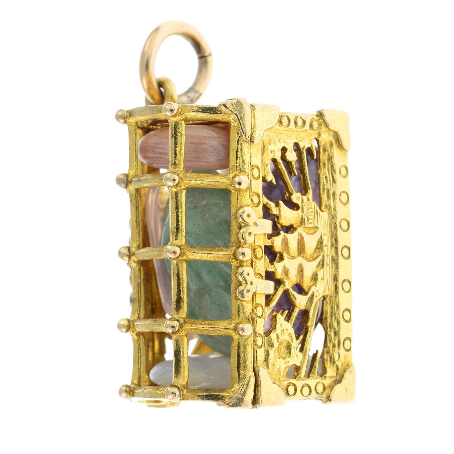 A 9ct gold tumbled gemstone treasure chest charm