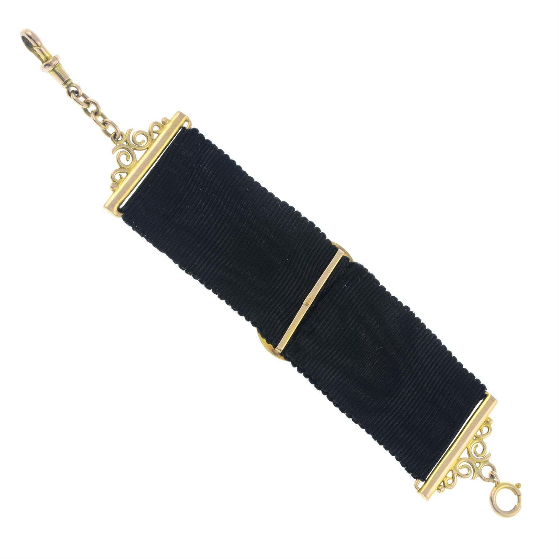 A late Victorian 9ct gold and fabric fob watch chain, with buckle highlight. - Bild 2 aus 2