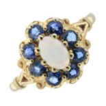 A 9ct gold opal and sapphire cluster ring.