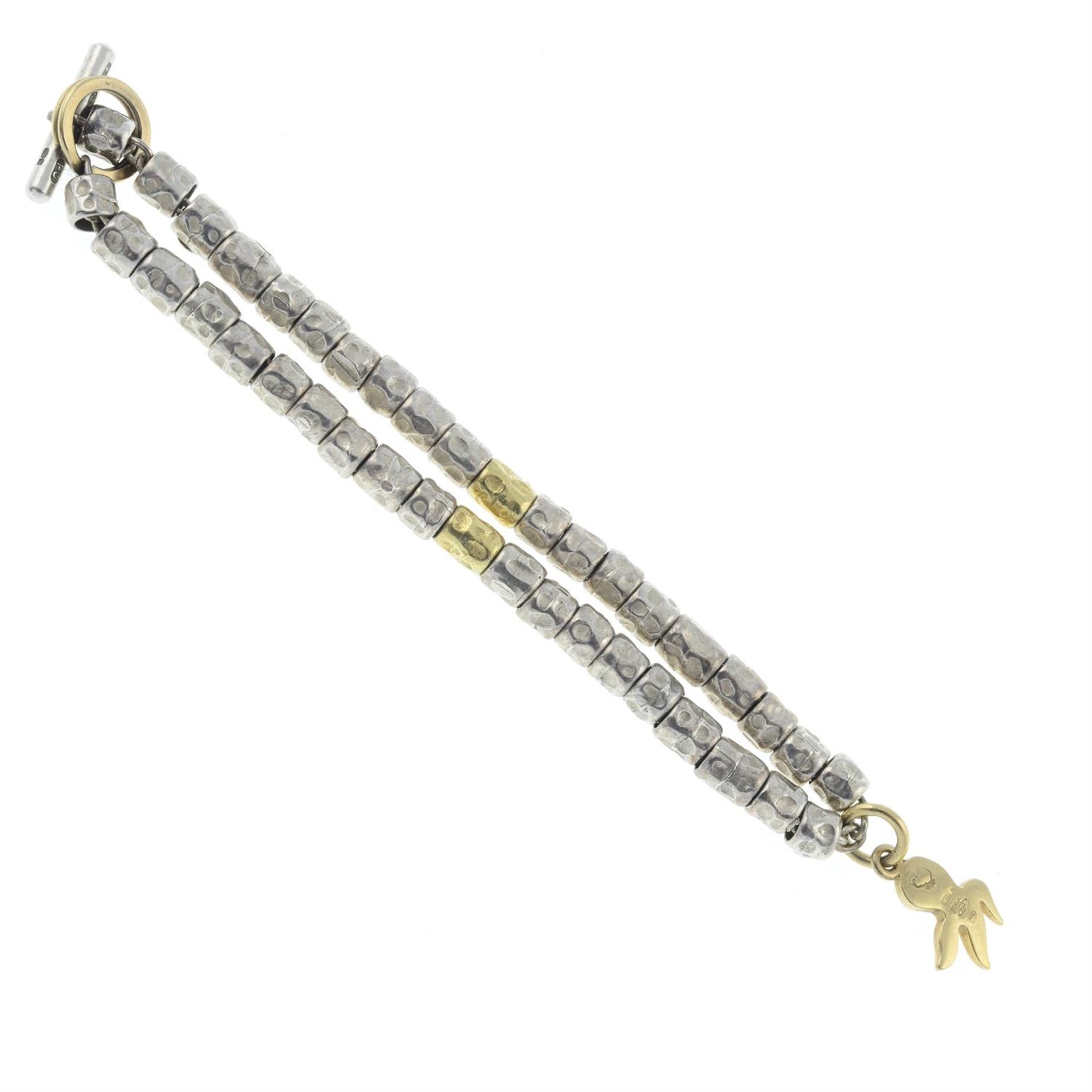 A silver 'Granneli' bracelet, with 18ct gold octopus charm, by Dodo. - Image 2 of 2