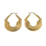 A pair of 9ct gold textured hoop earrings.