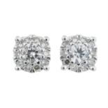 A pair of diamond cluster stud earrings.